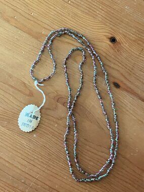 Beaded necklace handmade in India, featuring glass seed beads colorful